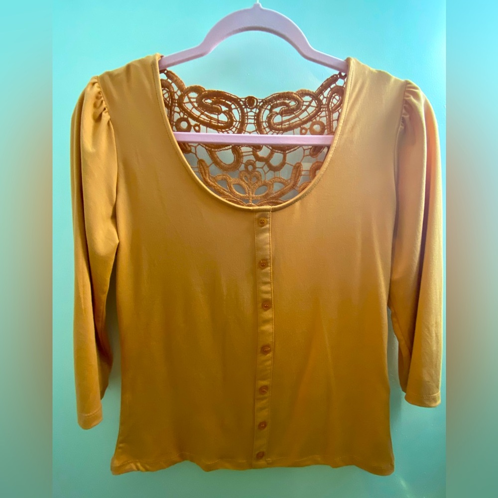 Top with lace on back